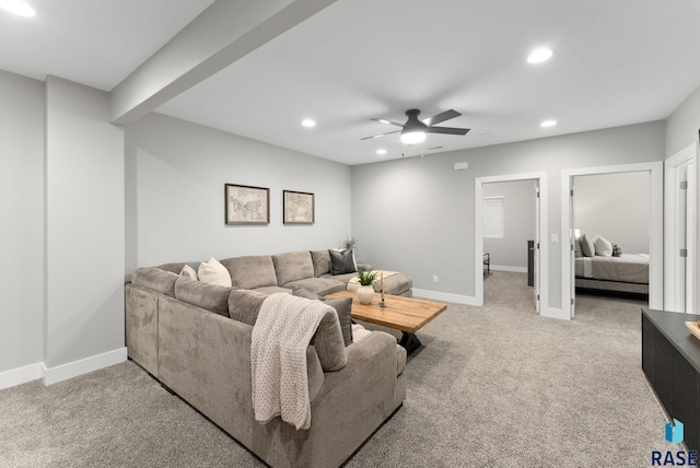 carpeted living room featuring beam ceiling and ceiling fan