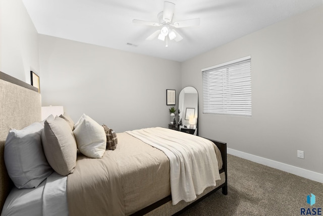 carpeted bedroom with ceiling fan