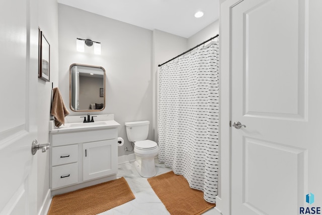 bathroom with vanity, a shower with curtain, and toilet