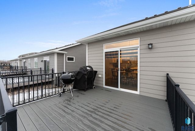 wooden terrace with grilling area