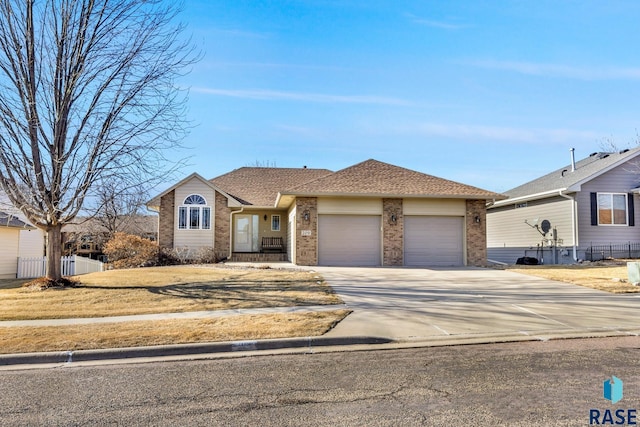 single story home with a garage