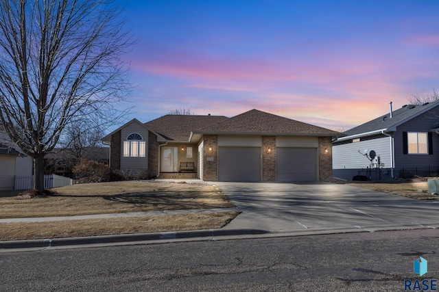 view of front of property with a garage