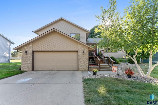 view of front facade featuring a garage and a front lawn