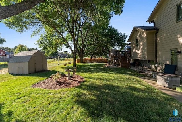 view of yard with a storage shed