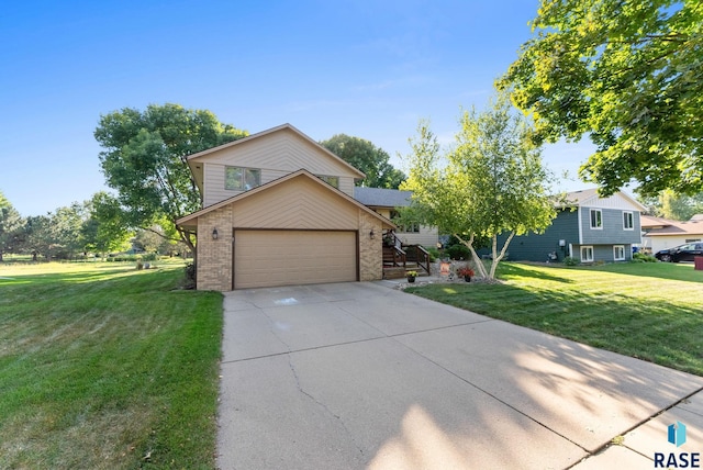 view of front of home featuring a garage and a front yard