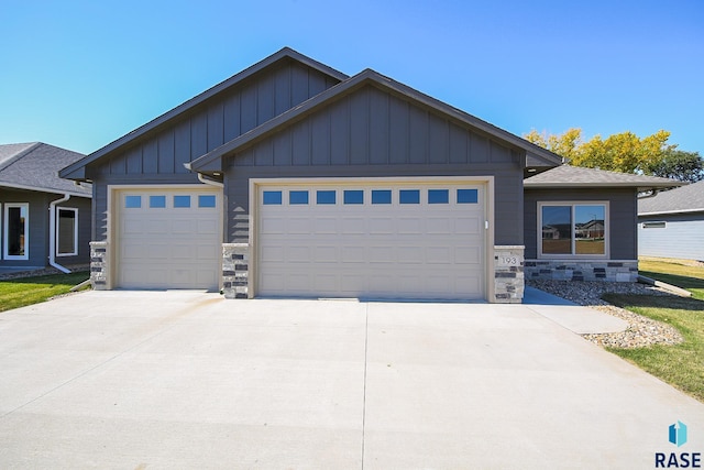 craftsman inspired home with a garage