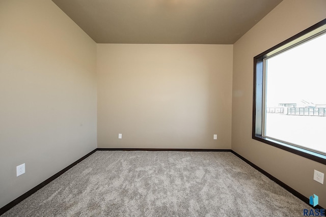 view of carpeted spare room