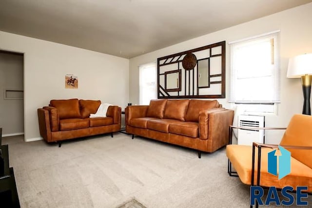 living room with a wealth of natural light and light carpet