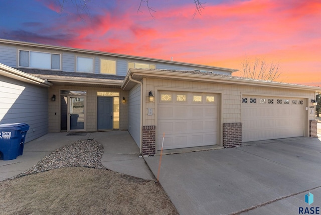 view of front of property with a garage