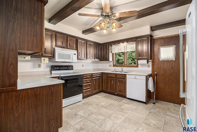 kitchen featuring beamed ceiling, sink, dark brown cabinetry, ceiling fan, and white appliances