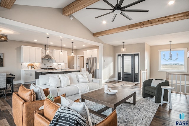 living room featuring lofted ceiling with beams and dark wood-type flooring