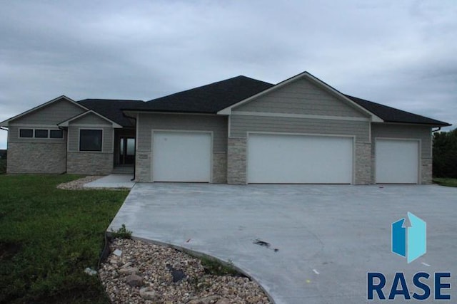 ranch-style home with a garage