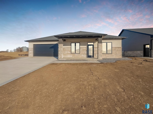 prairie-style home with a garage