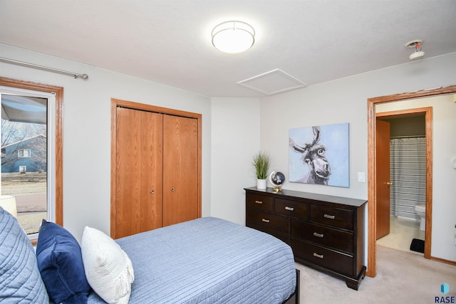 carpeted bedroom with a closet