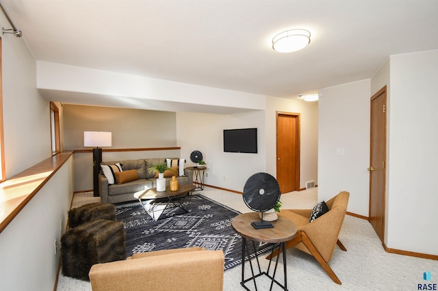 living room featuring light colored carpet