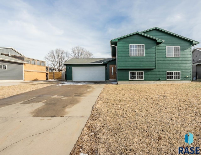 tri-level home featuring a garage