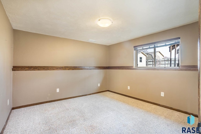 spare room featuring a textured ceiling