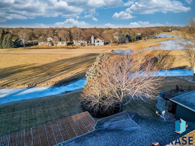 view of pool featuring a yard