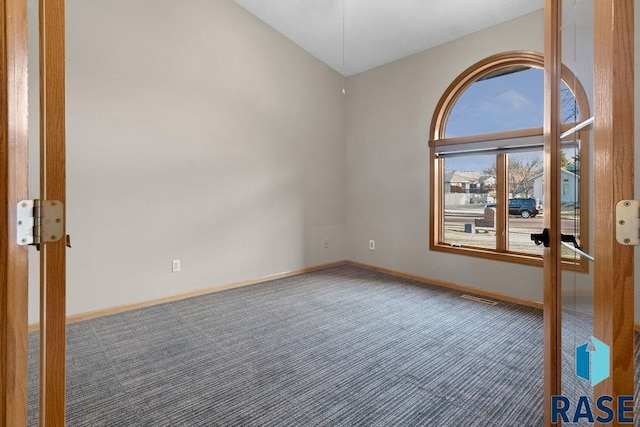 view of carpeted spare room