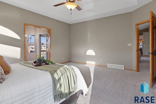 bedroom with carpet floors, access to exterior, and ceiling fan