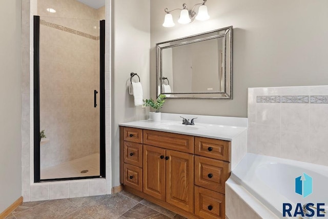 bathroom featuring vanity and plus walk in shower