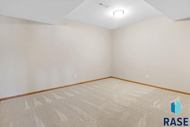 unfurnished room with carpet floors