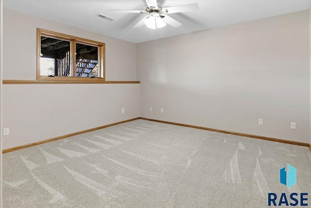 unfurnished room featuring carpet floors and ceiling fan