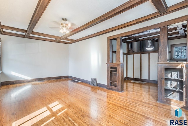 interior space with coffered ceiling, beam ceiling, light hardwood / wood-style flooring, and ceiling fan