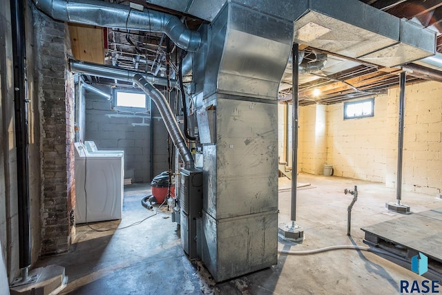 basement with separate washer and dryer