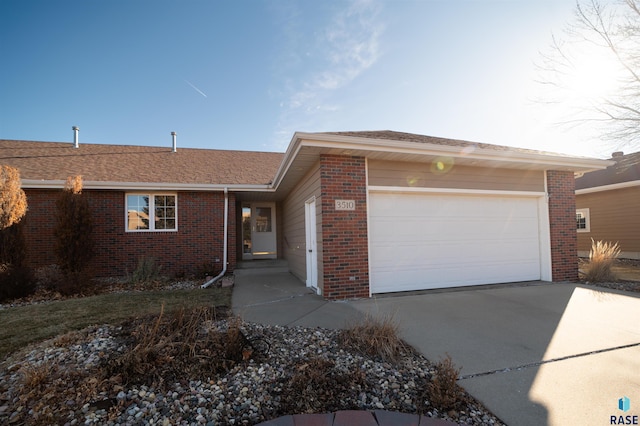 single story home featuring a garage