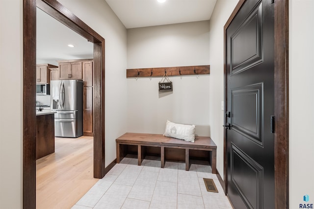 mudroom with light wood-type flooring