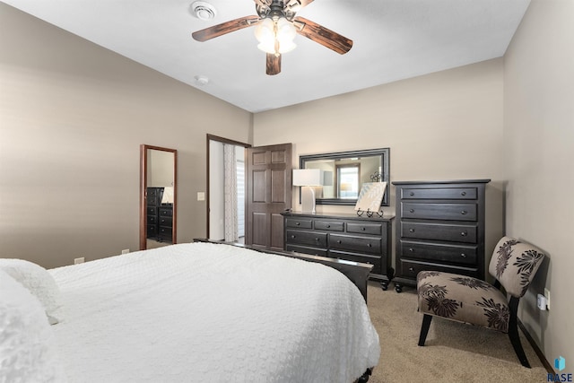 bedroom with light colored carpet and ceiling fan