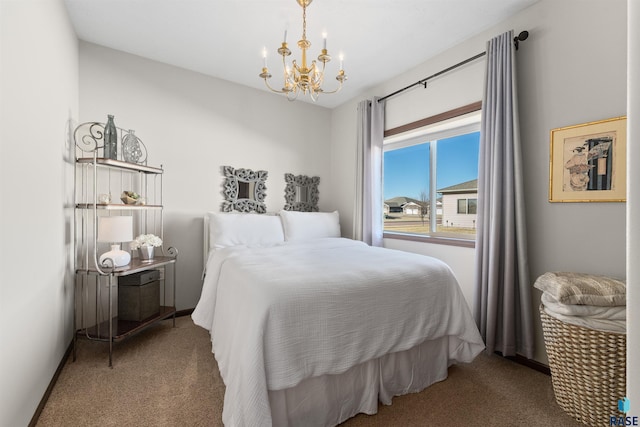 carpeted bedroom featuring an inviting chandelier