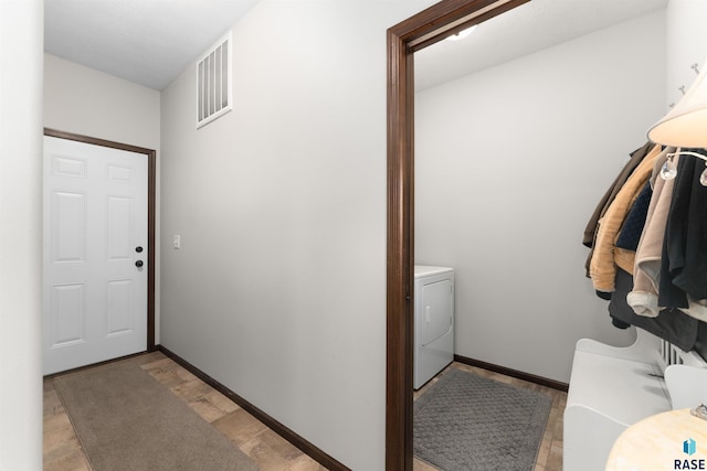 laundry room with washer / clothes dryer