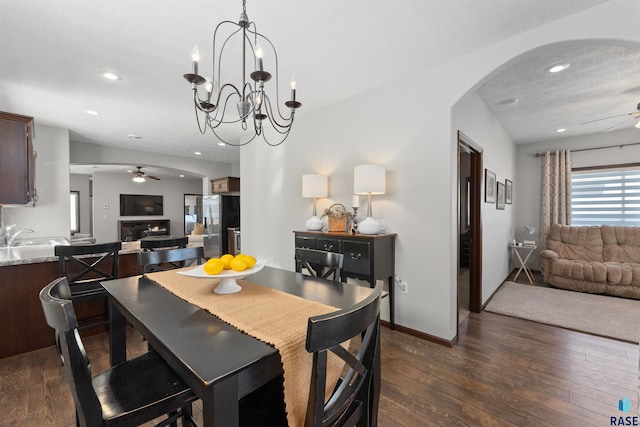 dining space featuring dark wood-type flooring and ceiling fan