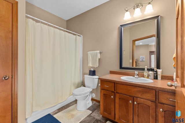 bathroom with a shower with curtain, vanity, and toilet