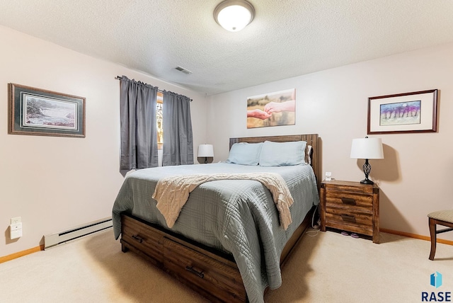 bedroom with light carpet, a baseboard radiator, and a textured ceiling