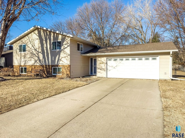 split level home featuring a garage