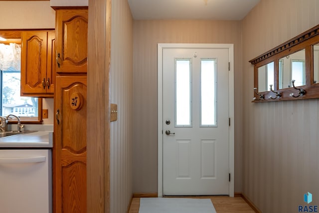 doorway to outside with sink