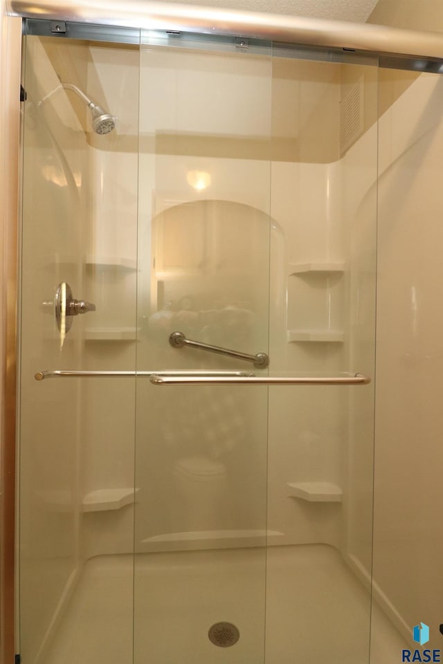 bathroom with walk in shower