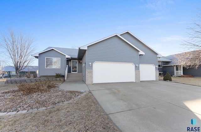 single story home featuring a garage