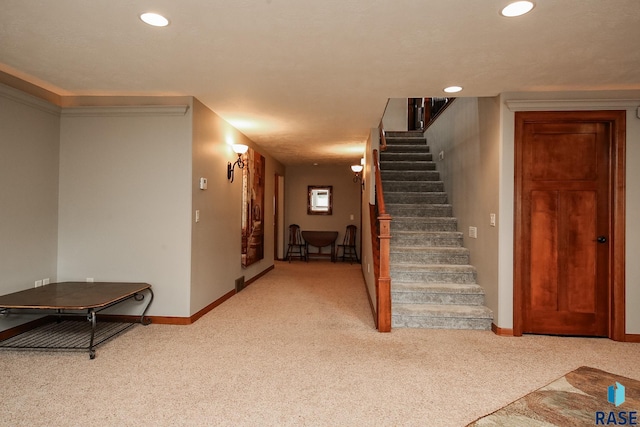 stairs with carpet flooring