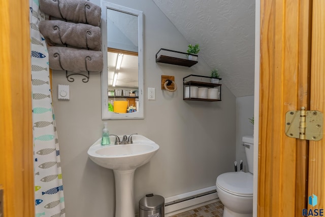 bathroom featuring lofted ceiling, toilet, a textured ceiling, and a baseboard heating unit