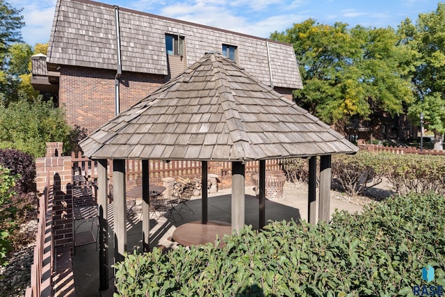 view of community with a gazebo and a patio area