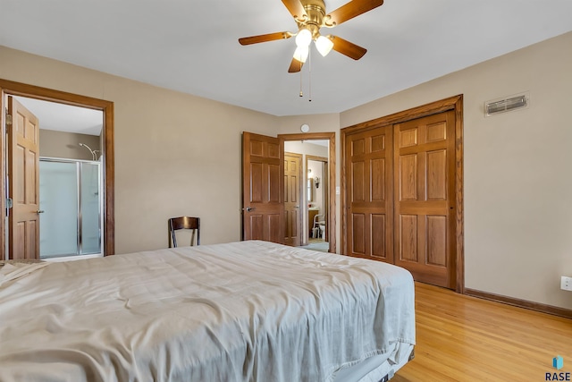 bedroom with ceiling fan, a closet, and light wood-type flooring