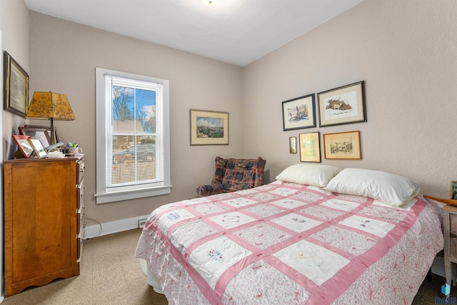 bedroom featuring light carpet