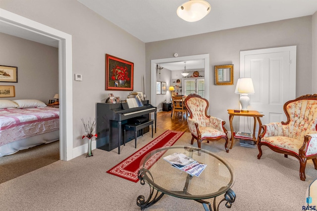 living area featuring carpet floors