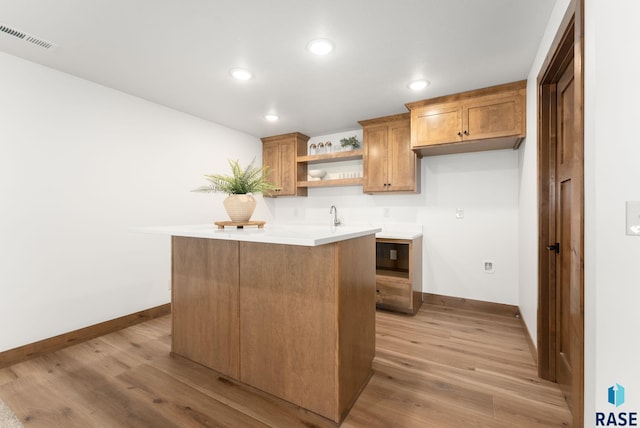 kitchen with light hardwood / wood-style flooring