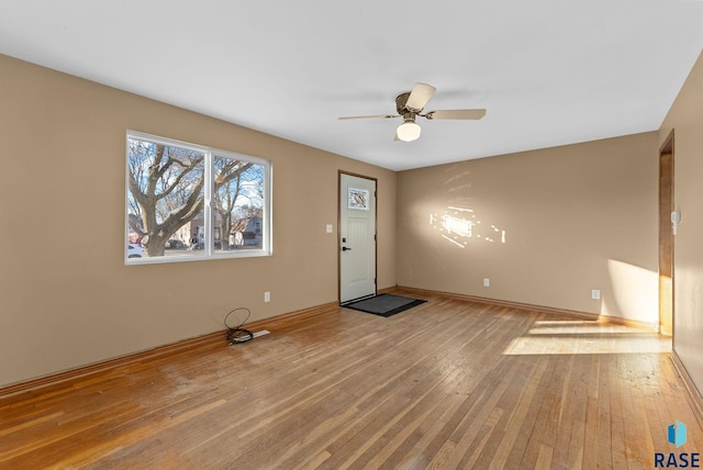 entrance foyer featuring light hardwood / wood-style floors and ceiling fan