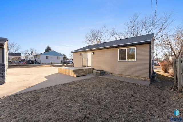 back of property featuring a patio